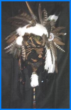 (named: Chief Piercing Eyes)...Mask hand made by BlueWolf (2009) using black deerskin, feathers, glass beads,deerskin lace,rabbit fur and glass wolf eyes )